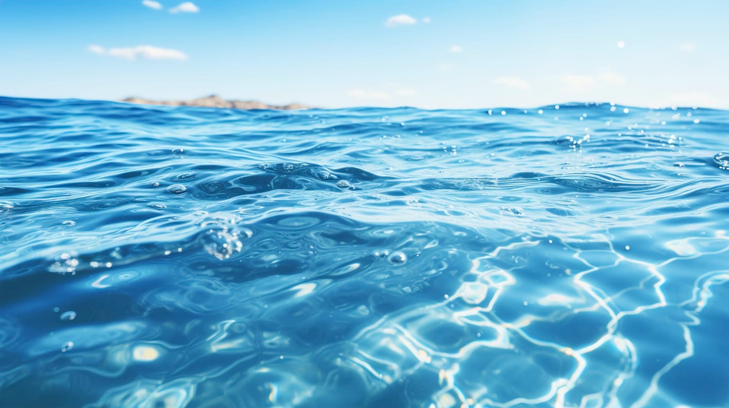 Still freshwater surface under a pale sky, suggesting a calm pause before pouring a glass of water indoors.